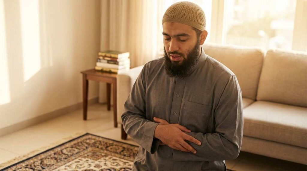 A Muslim adult standing in Salah on a prayer rug with an expression of deep presence and understanding in warm morning light